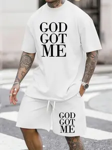 Men’s summer regular-fit cotton short-sleeve T-shirt and shorts set featuring a “GOD GOT ME” letter print. Fashionable casual menswear for going out, with pockets and an elastic waistband drawstring. Two-piece set suitable for running, golf, fishing, ba