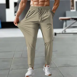 Men's Summer Ankle Sports Pants, High Stretch Fiber, Nylon 80%Spandex20%, Reflective Stripe Design At The Hem Of Pants Solid Color Breathable Fabric, Regular Fit WithZipperPockets, Breathable ComfortableRunningTraining LongTrousers