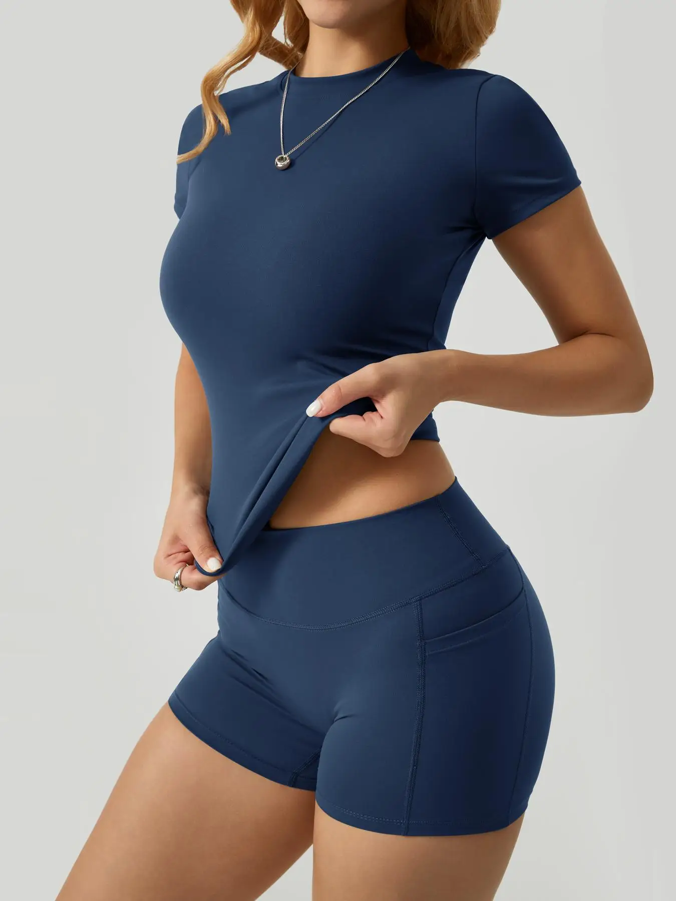 2 piece set women's yoga suit set solid color quick drying short sleeved top with pockets on both sides shorts with tight fit suitable for yoga gym tr