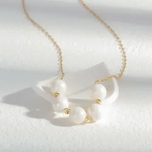 Matte White Beaded Gold Necklace with Lariat-Style Drop