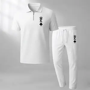 Stay stylish this summer with our Men's King print two-piece set, featuring a zippered polo shirt and drawstring trousers!
