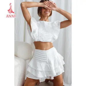 "Stay Chic and Cool with our Ruffle Trim Top and Mini Skirt Shorts Set in White, Blue, or Pink - Perfect for Summer!"