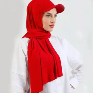 Jersey Hijab with baseball cap.