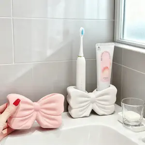 Bow Shaped Toothbrush Holder, Glossy Ceramic Toothpaste Organizer, 2 Slots Bathroom Vanity Countertop Accessory for Toothbrushes & Makeup Brushes Decor