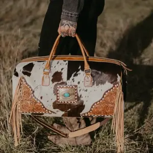 Tooled Cowhide Fringe Duffle Bag