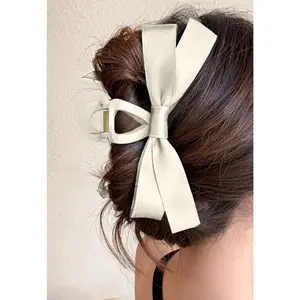 White bow claw clip