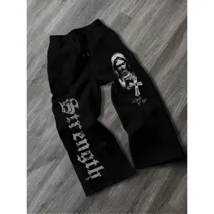 TikTok Trending! Black sweatpants with "Strength" text, a religious - themed graphic (figure with cross), and "Light of life" script. Edgy design, perfect for bold streetwear with spiritual vibes. Drawstring Waist Sweatpants