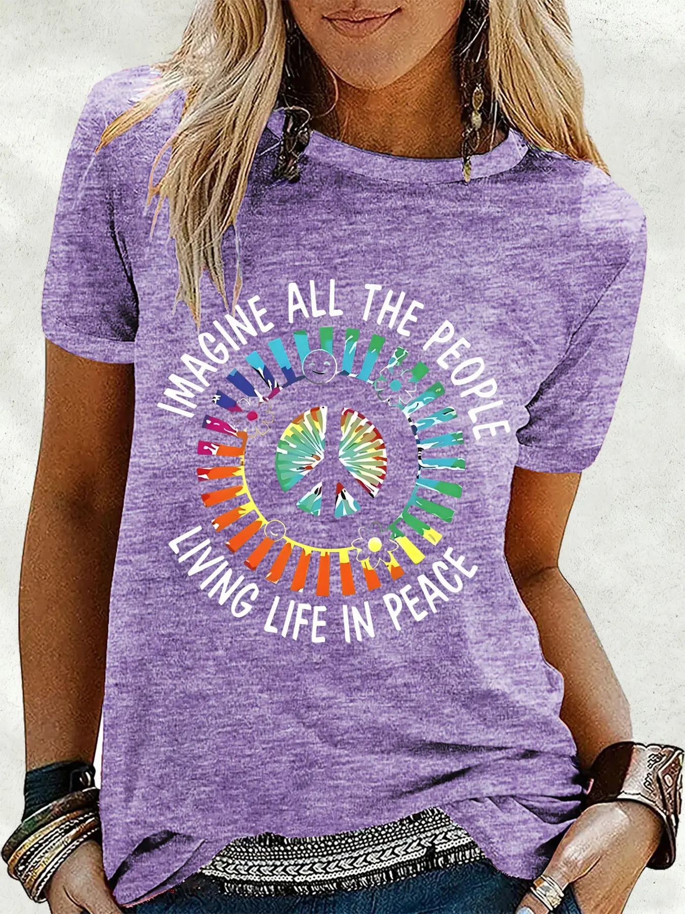 Women's short-sleeve T-shirts feature casual tie-dye hippie culture art prints with themes of love and peace. Designed for music and rock enthusiasts, these tops come in pink, blue, green, purple, and dark green, are comfortable, suitable for vacations