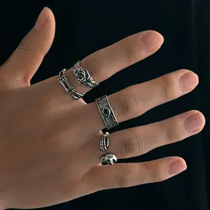 4Pcs Vintage Gothic Skull Rose Bone Stackable Ring Set for Men Women, Antique Silver Evil Eye Skeleton Hand Open Adjustable Band Rings, Edgy Grunge Punk Statement Finger Jewelry for Rock Concert Streetwear