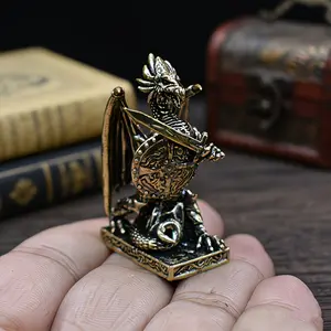 Vintage Brass Fantasy Dragon Sword Shield Statue, Knight Style Relief Craft, Detailed Scale Armor Details, Metal Texture Desktop Ornament