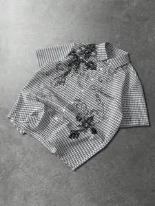 A stylish, casual, lightweight, Streetwear short-sleeved shirt with summer checkered cross-print design and single button closure, suitable for men and women. It's comfortable, versatile, perfect for hip-hop, campus, and outdoor activities