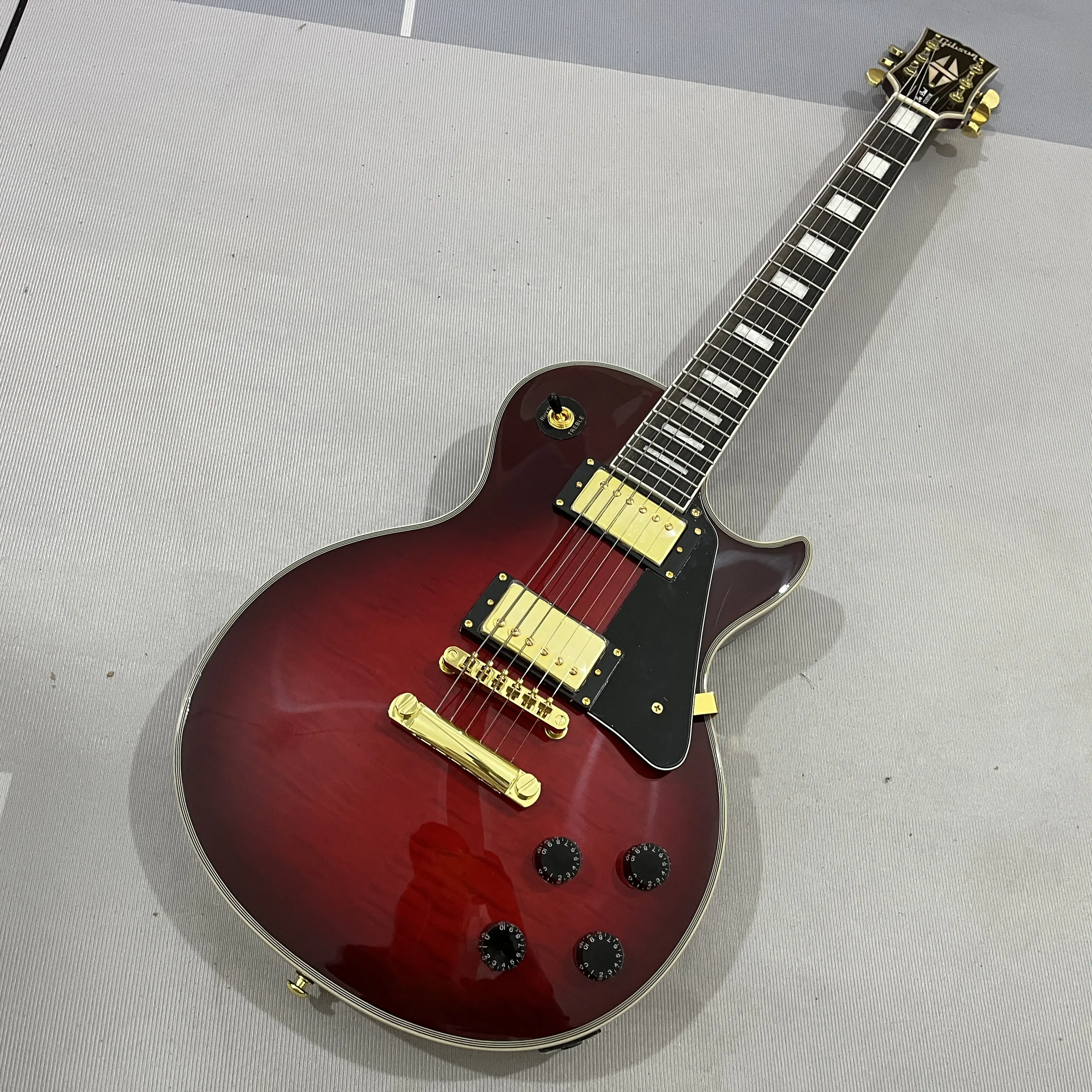 Wine Red Solid-Body Les Paul Style String Instrument, Mahogany Body Electric Guitar with Flame Maple Veneer and Gold Hardware, Les Paul Style String Instruments