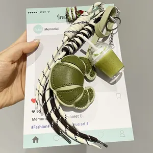 Leather Croissant-Shaped Woven Keychain, Coffee Cup Croissant Design, Available In Multiple Colors, Compact And Portable, Unisex Bag Accessory, Keychain
