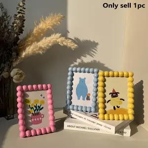 Cute Resin Decorative Photo Frame — A charming home accent and desktop photo display stand, perfect for showcasing family photos; holds 6-inch prints.