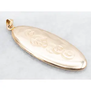 Gold "LSE" Engraved Elongated Oval Locket