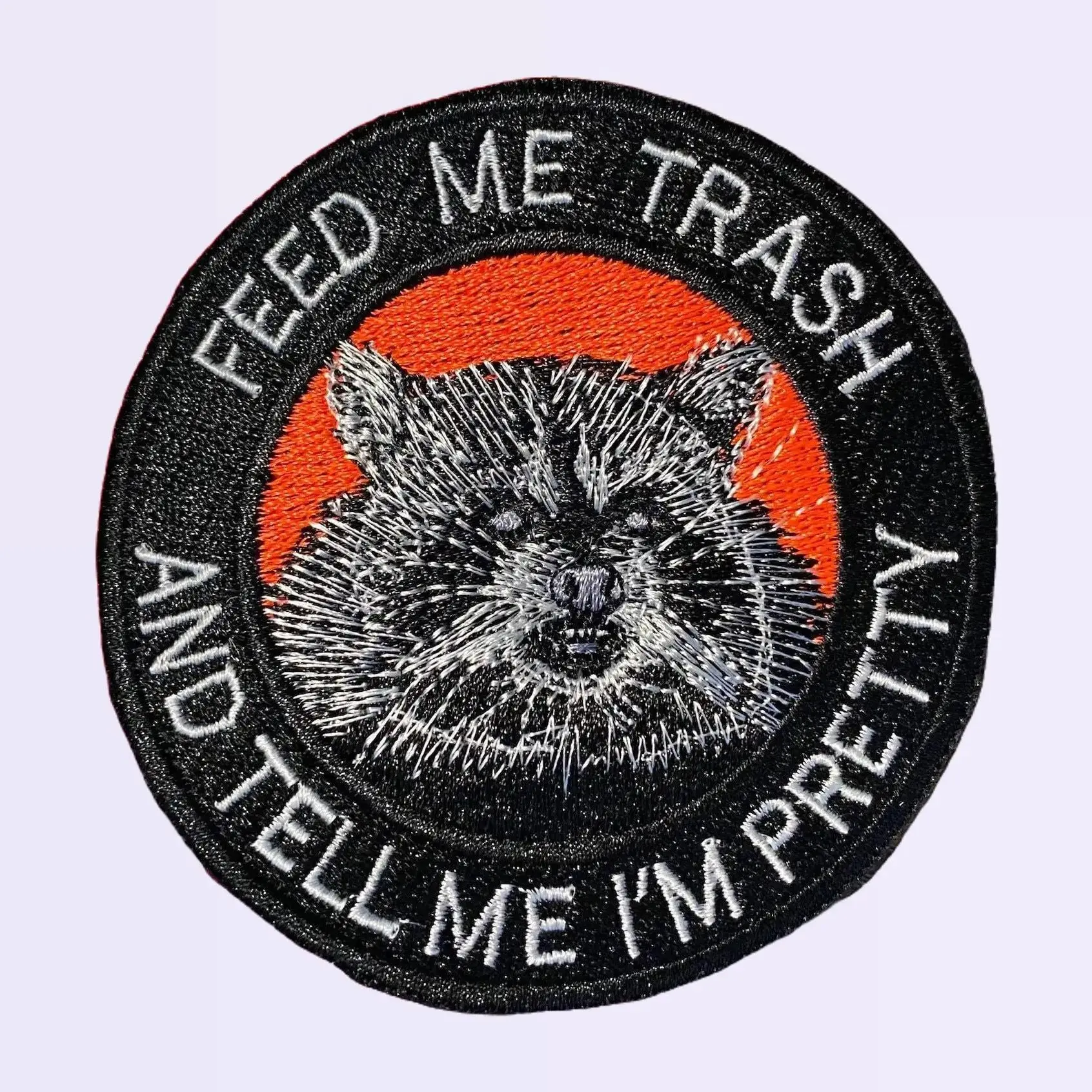 "Feed Me Trash And Tell Me I'm Pretty" Embroidered Raccoon Patch, 3x3 in, Durable Embroidery, Versatile Iron-On-Sew-On-Hook Backing, for Jackets, Backpacks