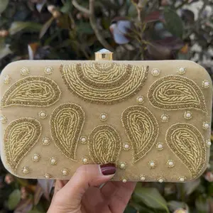 Beatiful gold clutch with zardozi and bead work