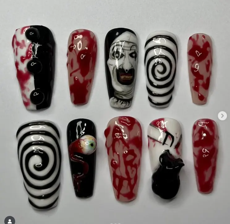 Terrifying and Bold Nail Art with Horror Themes – Featuring Creepy Clowns, Blood Drips, Swirls, and Disturbing Eyes for a Spooky Look!
