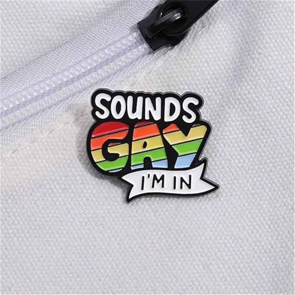 SOUNDS GAY I'M IN Rainbow Enamel Pin LGBTQ Badge Lesbian Gay Pride Brooch Lapel Pin Clothing Bags Jackets Accessory Jewelry Gift, Black