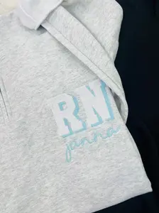RN HALF ZIP SWEATSHIRT