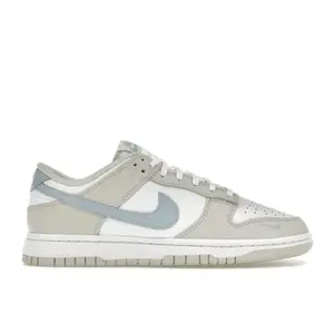 Nike Women's Dunk Low Light Bone Armory Blue, from StockX