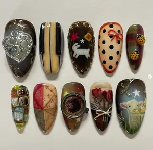 Cozy cottagecore nails with vintage vibes featuring piano keys, rabbits, roses, ladybugs, coffee art, patchwork, and dreamy countryside charm