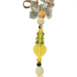 Handmade Beaded Keychain with Yellow Gummy Candy Heart and a Popcorn Charm - Crafted Beads Design