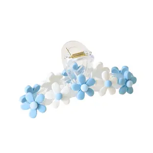 Carolina Blue and White Floral Hair Clip by the Darling Effect