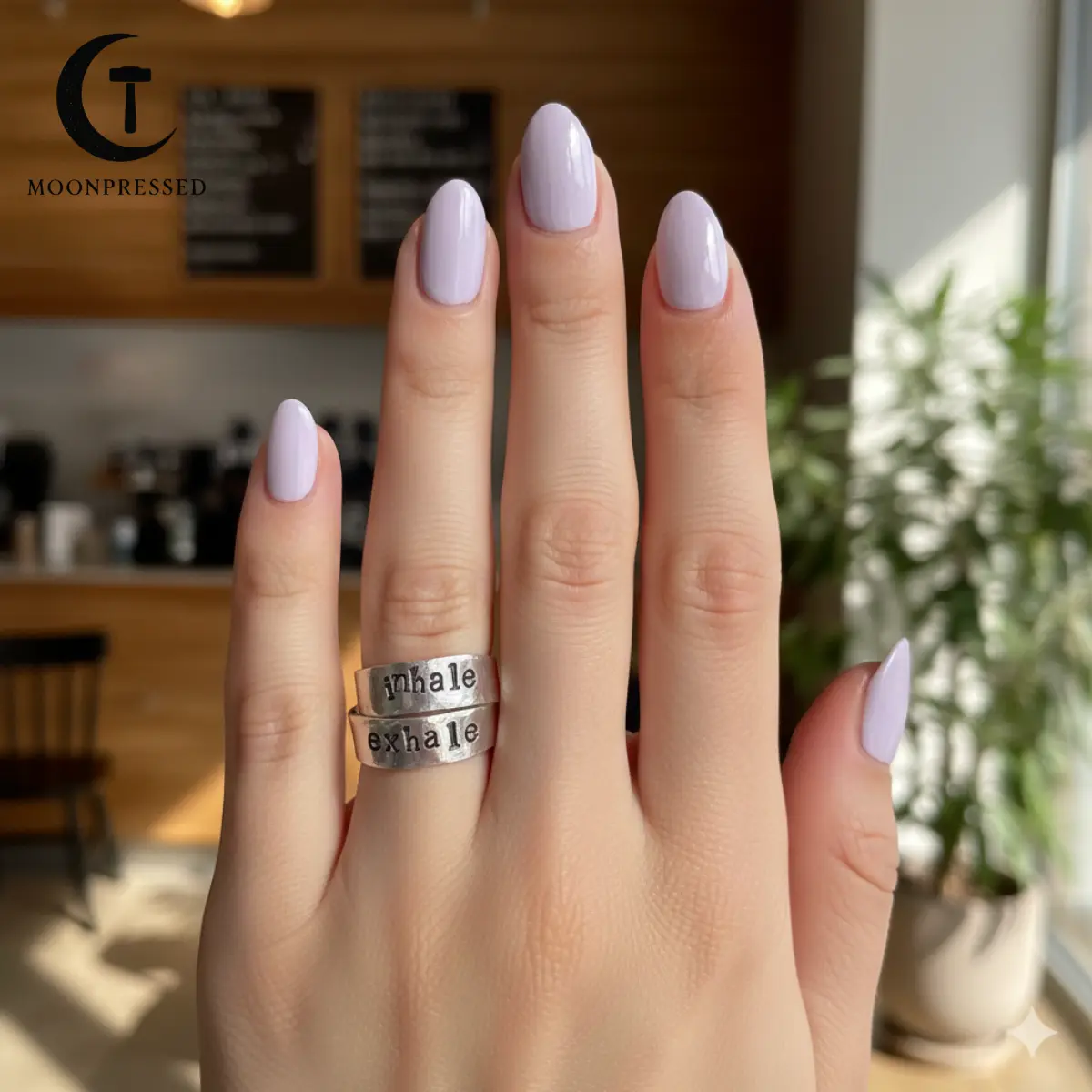 The Inhale Exhale Ring - Acts as a wearable breathing exercise whenever you need a moment of calm
