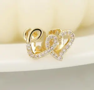 Hip-Hop Double-Heart Teeth Grillz in Gold, Copper Dental Accessory with Sparkling Micro-Inlaid Zircon for Parties & Street Fashion, Teeth Accessory