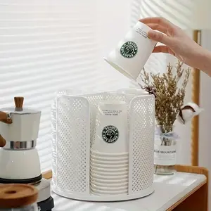 This rotating paper cup holder features four compartments, a disposable coffee cup dispenser, a storage box, and a removable plastic cup storage and lid holder. Suitable for countertops, kitchens, coffee stations, and bathrooms.