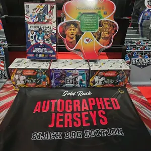 Break 457. Rookies and Stars hobby. 2026 Gold Rush Black Bag Edition Autographed & Authenticated NFL Jersey. (2) Phoenix blasters. Optic blaster. 2026 Clover tin with 7 multi-year packs & clover promo card.