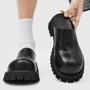 Men’s Black Glossy‑Leather Round‑Toe Platform Clog Mules. Voluminous round toe creates avant‑garde vibe, chunky lug sole boosts leg‑lengthening effect. Glossy leather enhances premium texture, slip‑on style for easy wear