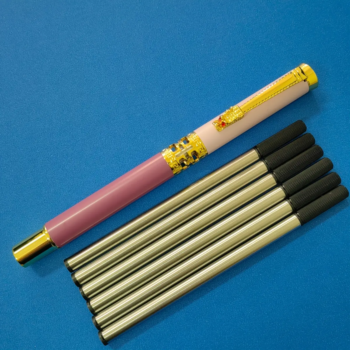 1 pink pen + 6 black refills