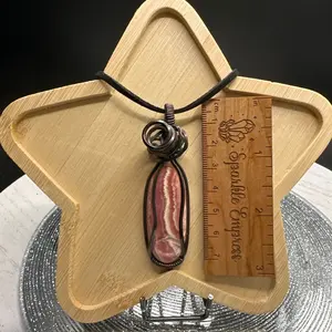 Rhodochrosite hand wired pendant.
