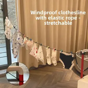 Outdoor hookable clothes drying line for travel, portable and extendable, wind-resistant, suitable for drying clothes during camping.