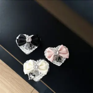Creative Bow Heart Phone Stand - Adhesive Telescopic Stand - Everyday Desktop Phone Stand - Portable and Practical - Suitable as a Delicate Gift - Universal Smartphone Holder