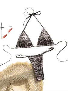 A two-piece bikini featuring leopard and snake print thin straps, high-waisted, backless, split-style two-piece swimsuit for women, with pearls embellishing the chest, Tie back bikini, Triangle Bikini Set