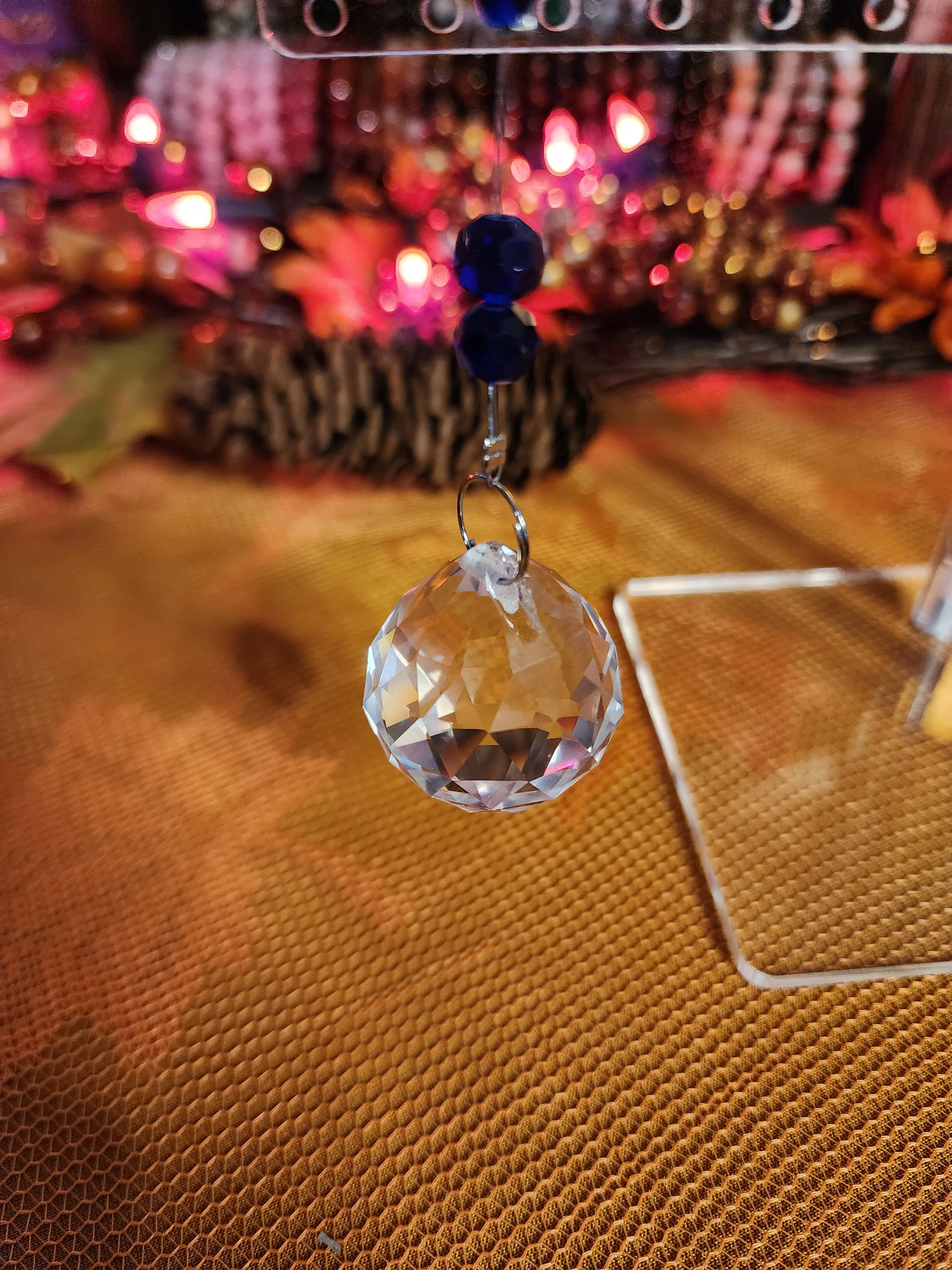 Glass evil eye with butterfly sun catcher