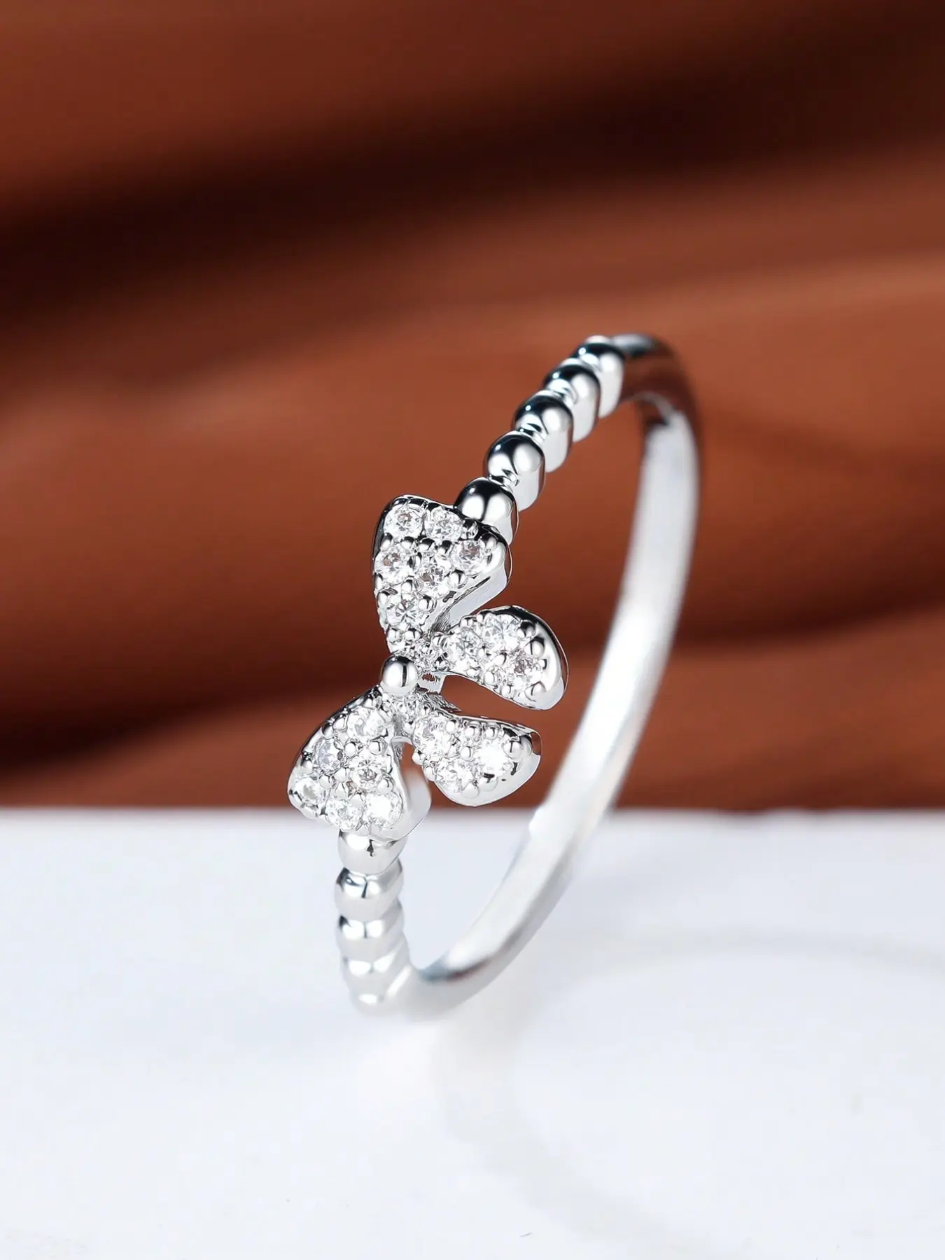 A cute bow-shaped ring with Charming Bow Accent, Durable Metal Coating, adorned with artificial zirconia stones, Dainty Engagement Ring, Artificial zircon rings, perfect for everyday casual wear, dates, or as a birthday gift