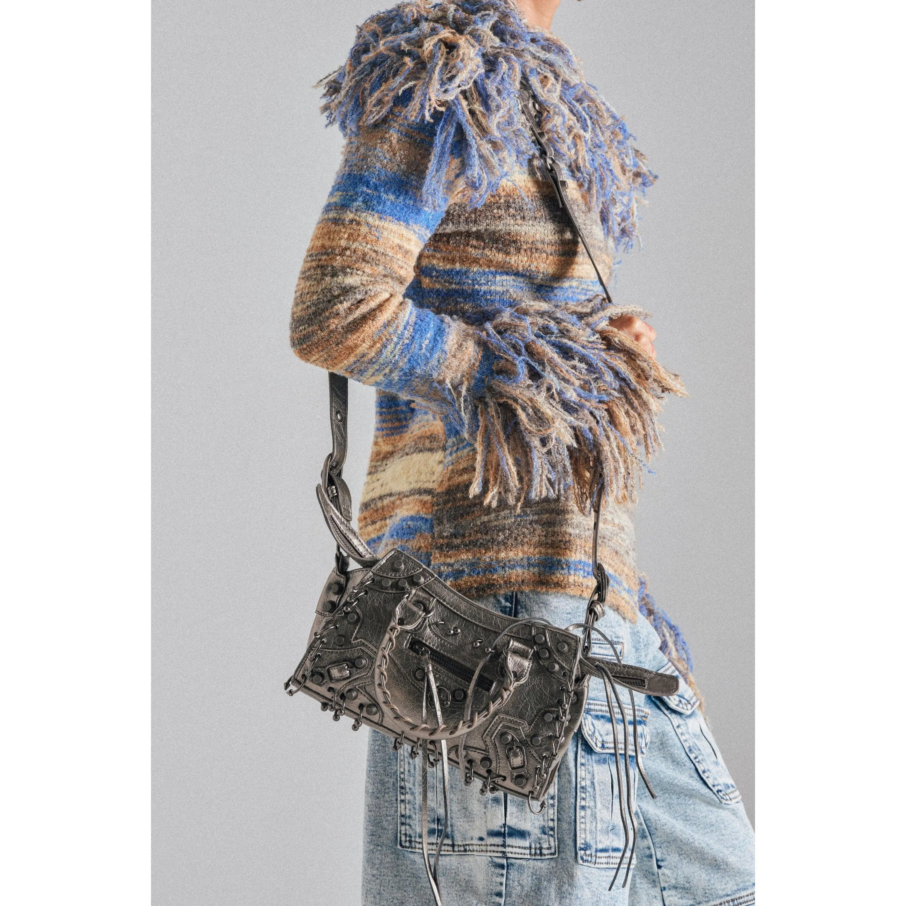 GRUNGE PIERCED PURSE
