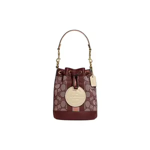 COACH Dempsey 14-Inch Drawstring Bucket Bag for Women – Signature Jacquard and Pebbled Leather – Burgundy