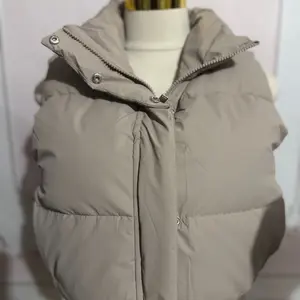 Taupe High Neck Cropped Puffer Vest Stylish Essential for Women Comfortable & Fashionable