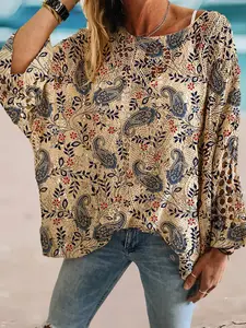 Spring and summer round-neck diamond hollow batwing-sleeve Women top, bohemian Style geometric print, casual layering cardigan for beach vacations.