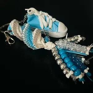 Baby Blue Shoe Boondoggle Colorful Bag Charm with Multiple Strings of Plastic Lanyard String Adorable Spiral Stitch Design Nostalgic Collectible
