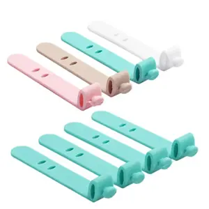 Silicone cable clips, data cable organizers, headphone and charging cable organizers, anti-slip, durable, portable cable management straps, cable management tool kits, computer peripheral cable organizers.