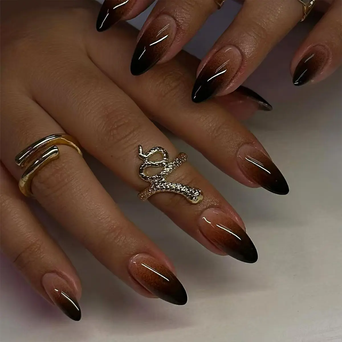 24 piece almond acrylic press on nails simple daily black gradient fake nails suitable for ladies and girls  It's a must have for daily outings work shopping and gatherings almond nails come with 1 piece of jelly glue and 1 strip
