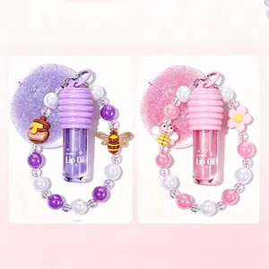 Glitter Lip Gloss with Keychain and Beaded Phone Wrist Strap,Cute Clear Pink Honey Lip Gloss Set for Girls,Hydrating Fruit Flavored Tinted Girls Lip Oil Stain Long Lasting With Box Gifts