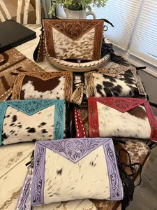 Cowhide tooled leather wristlet with fringe