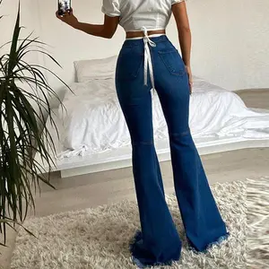Effortlessly Edgy: Colored Stretch Denim Trousers with Ripped Frayed Flared Hem - Elevate Your Look with Trendy Distressed Details
